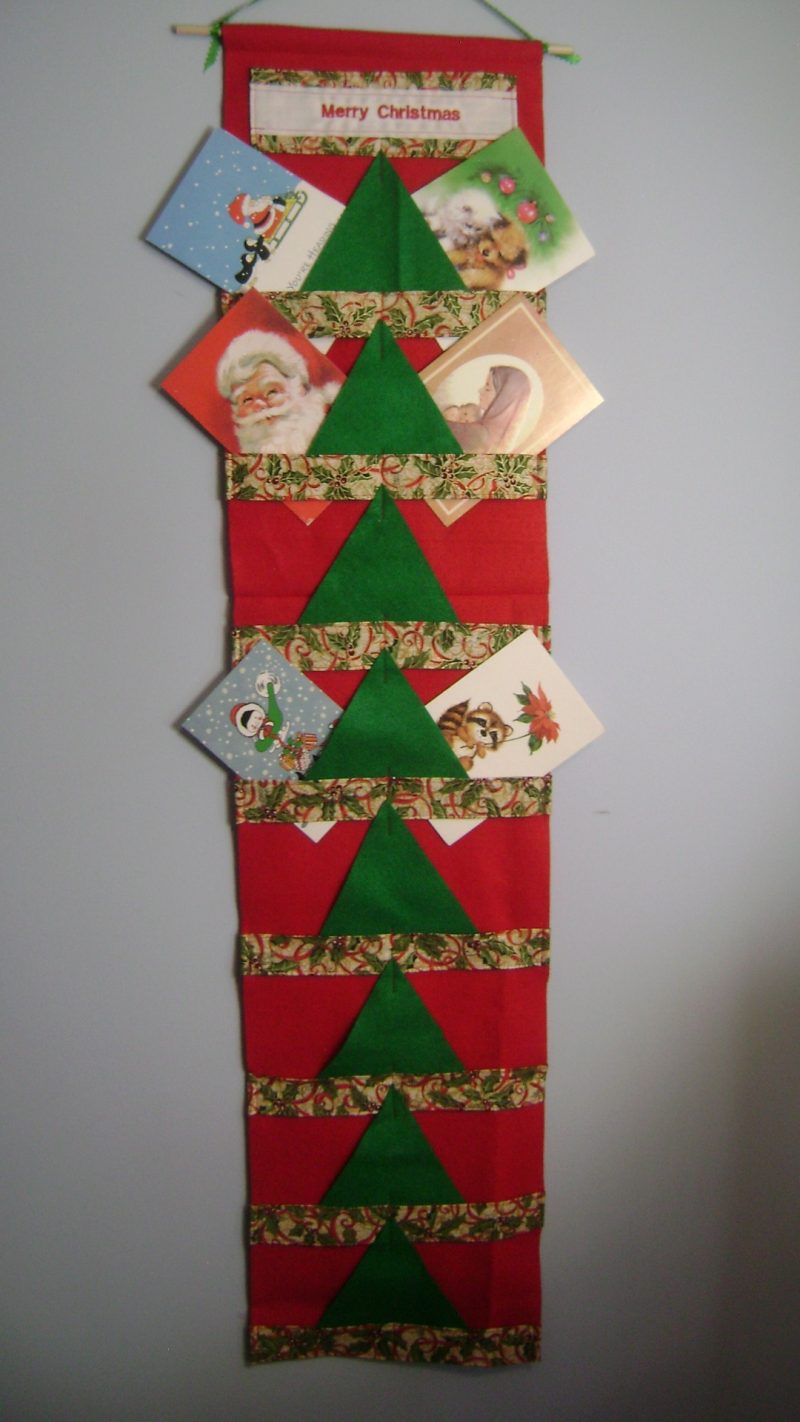 Fabric is my favorite one for Christmas. It has red ribbon and green ivy with gold highlights.